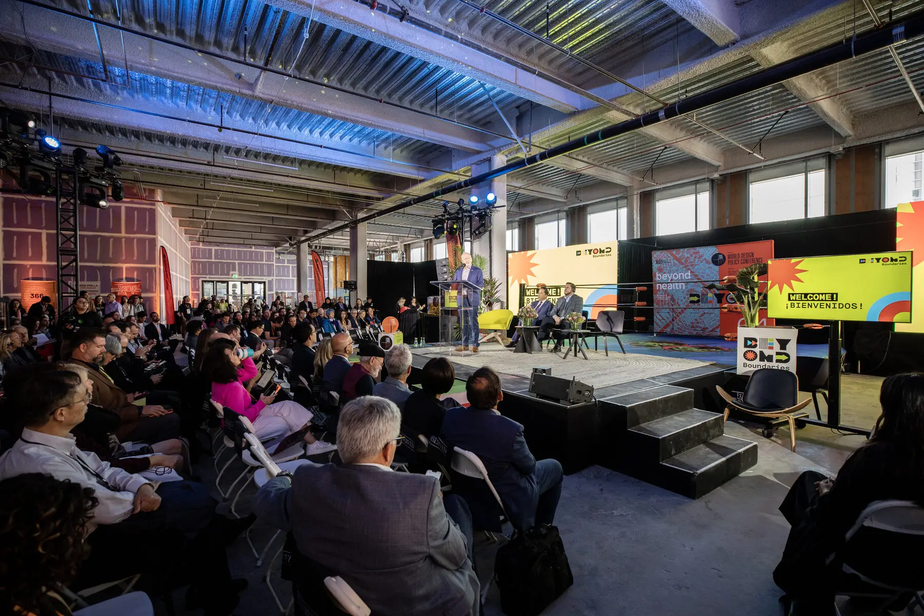A full audience faces the World Design Policy Conference stage