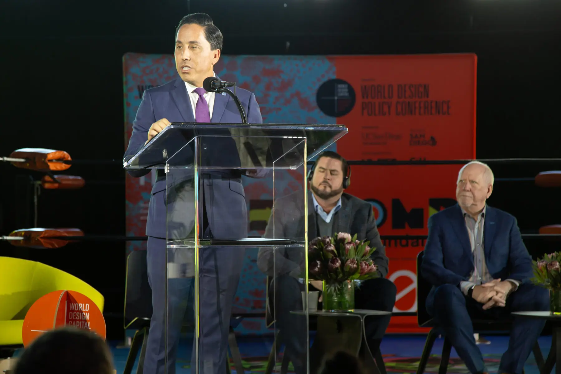 Mayor Todd Gloria speaks at a clear podium